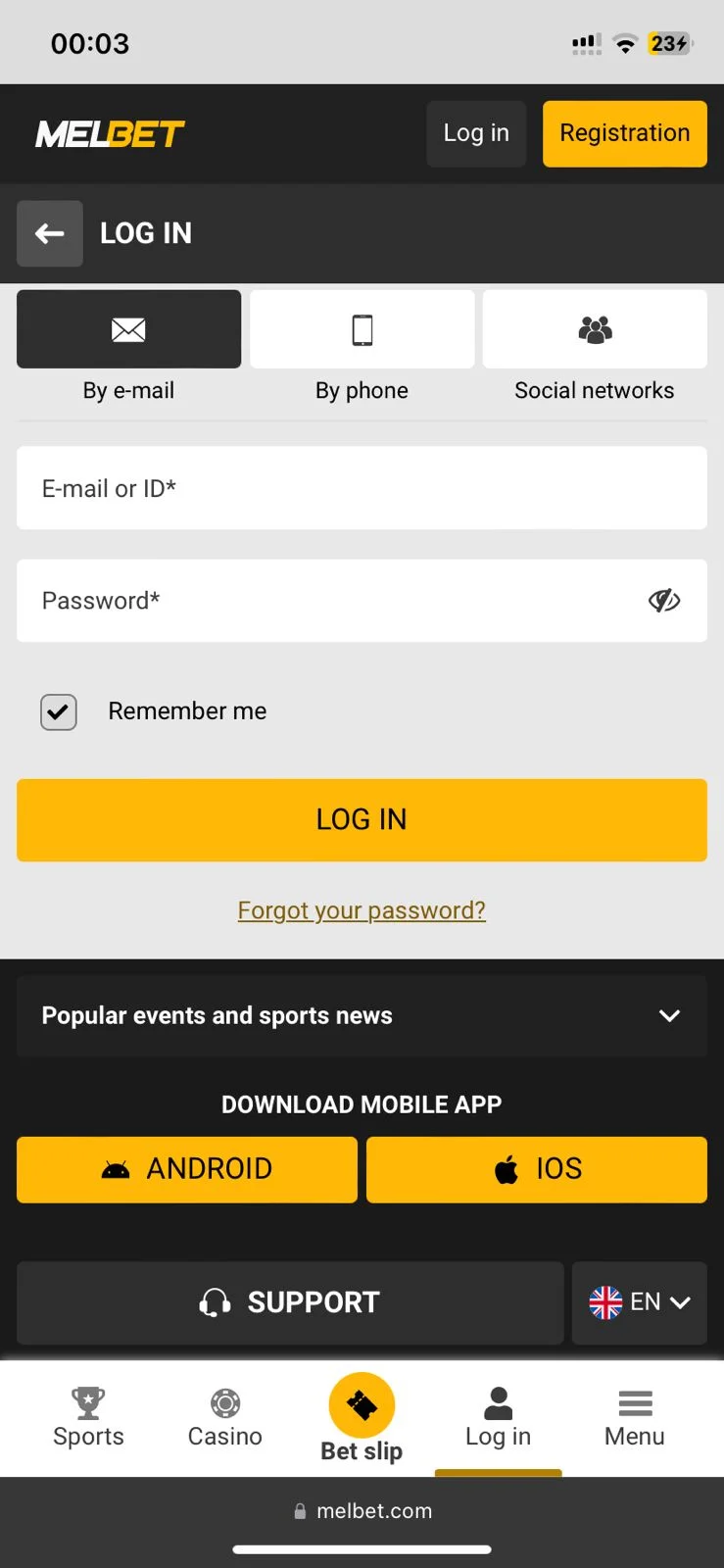 Melbet mobile login screen with e-mail, password, Remember me and a Log in button